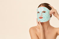 Woman wearing the KAVENIS LED light therapy mask